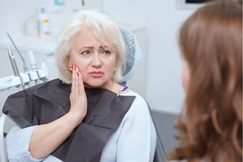 Dentist for seniors at Birch Dental providing specialized dental care